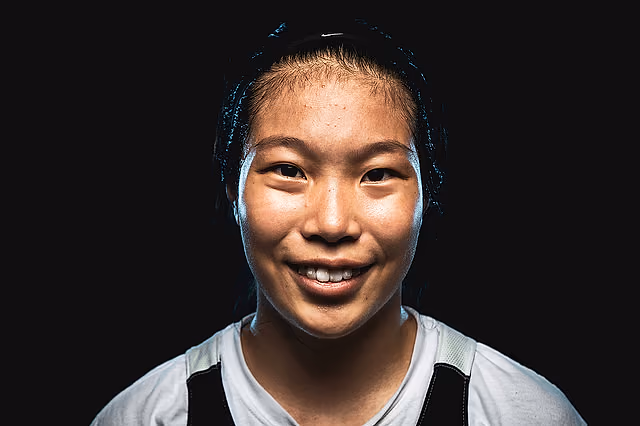 Smiling California Storm player in a studio portrait.