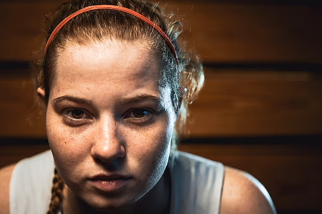 Focused California Storm player looking into the camera in a gym.