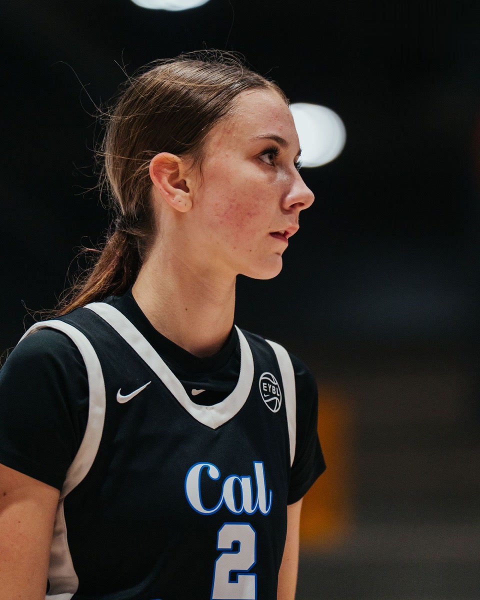 California Storm player in a black EYBL uniform focused between plays