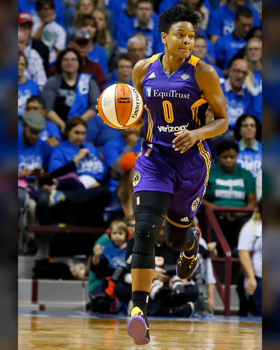 Alana Beard dribbles during Los Angeles Sparks competition.